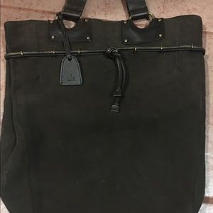 Authentic Gucci brown , great bag , fits everything you need , no flaws